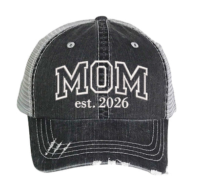 Black MOM Est. 2026 Distressed Trucker Hat. This premium vintage-style cap is the perfect gift for the unapologetically bold, featuring a breathable mesh back and custom embroidery. - DSY Lifestyle