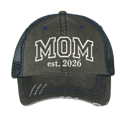 Dark Green MOM Est. 2026 Distressed Trucker Hat. This premium vintage-style cap is the perfect gift for the unapologetically bold, featuring a breathable mesh back and custom embroidery. - DSY Lifestyle