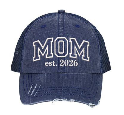 Navy Blue MOM Est. 2026 Distressed Trucker Hat. This premium vintage-style cap is the perfect gift for the unapologetically bold, featuring a breathable mesh back and custom embroidery. - DSY Lifestyle