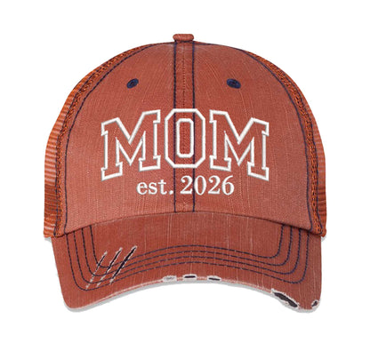 Orange MOM Est. 2026 Distressed Trucker Hat. This premium vintage-style cap is the perfect gift for the unapologetically bold, featuring a breathable mesh back and custom embroidery. - DSY Lifestyle