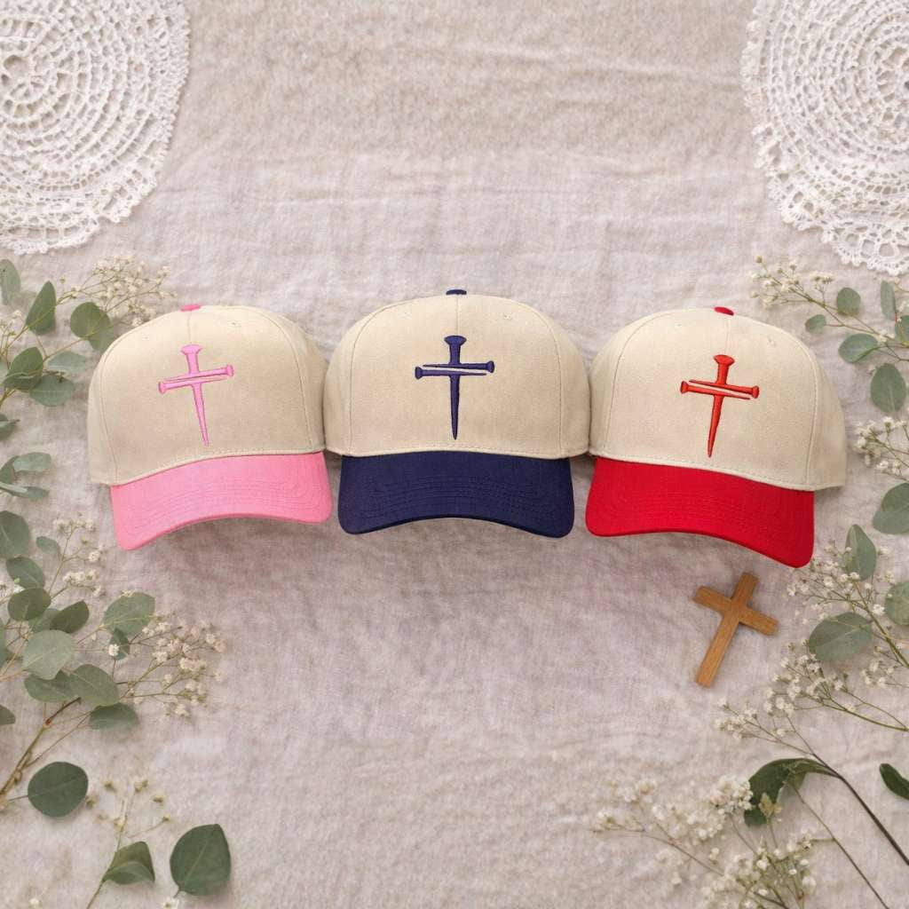 Display set of three Nail Cross 3D Puff Two-Tone Baseball Hats featuring a raised nail cross on a structured natural crown with a contrasting visor; a premium faith statement by DSY Lifestyle.