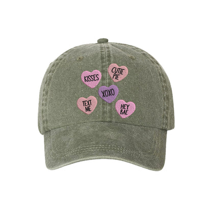 Olive Candy Hearts Washed Baseball Hat featuring colorful pastel conversation heart embroidery on a vintage washed dad cap by DSY Lifestyle.