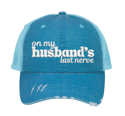 Aqua On My Husband’s Last Nerve Distressed Trucker Hat. This premium vintage-style cap is the perfect gift for the unapologetically bold, featuring a breathable mesh back and custom embroidery. - DSY Lifestyle