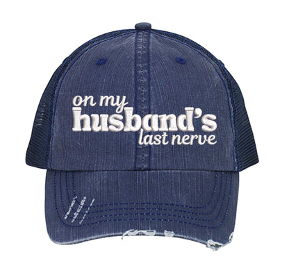 Navy Blue On My Husband’s Last Nerve Distressed Trucker Hat. This premium vintage-style cap is the perfect gift for the unapologetically bold, featuring a breathable mesh back and custom embroidery. - DSY Lifestyle