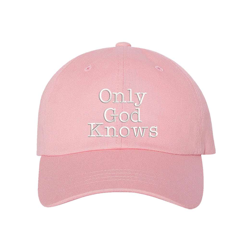 Light pink baseball hat with the phrase only god knows embroidered on it- DSY Lifestyle