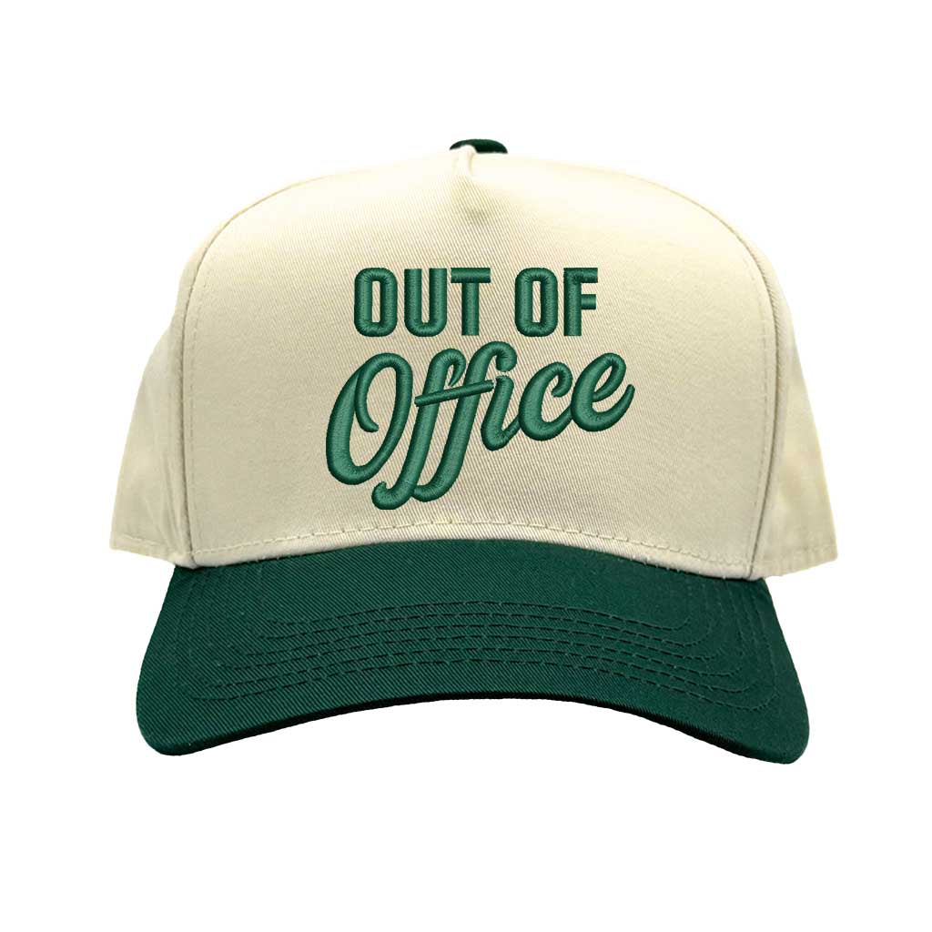 Natural Forest Green Two-tone Out of Office embroidered dad hat with white front panel and beige brim, featuring bold black text and adjustable strap. – DSY Lifestyle.