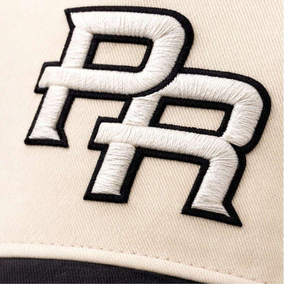 Close-up of a cap with embroidered PR Initials Puerto Rico DSY Lifestyle
