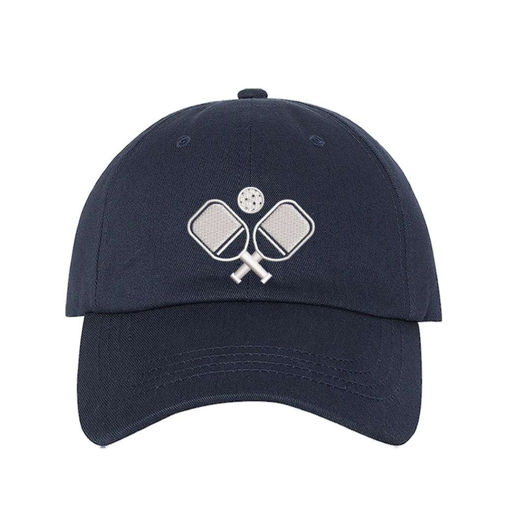 navy baseball cap embroidered with a pickleball rackets - DSY Lifestyle