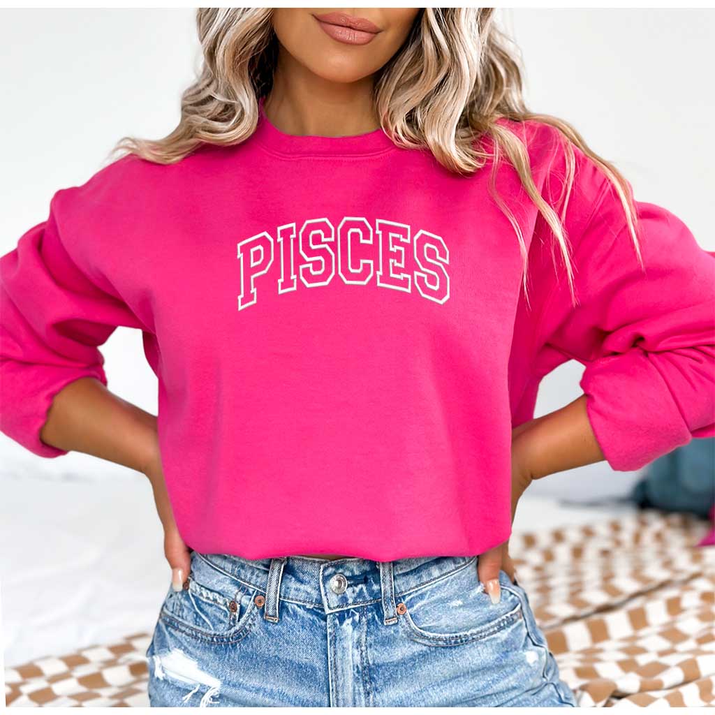 Person wearing a embroidered pink &