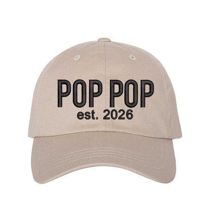Stone Pop Pop Est. 2026 Baseball Hat featuring bold black embroidery on a premium dad cap; a stylish 2026 announcement gift for new grandfathers by DSY Lifestyle.