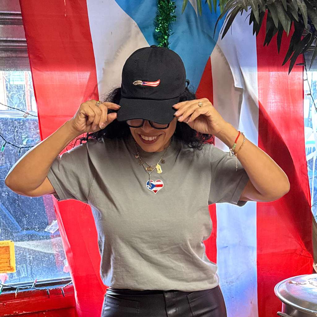 Heather gray washed Comfort Colors t-shirt from DSY Lifestyle featuring a bold embroidered Puerto Rican flag heart in the center of the chest.