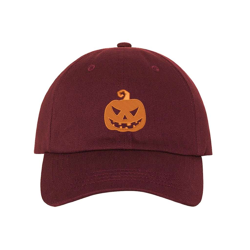 Burgundy Baseball hat embroidered with a orange jack o&