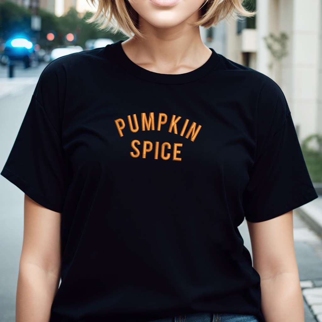 Female wearing a Black T-shirt embroidered with Pumpkin Spice - DSY Lifestyle 