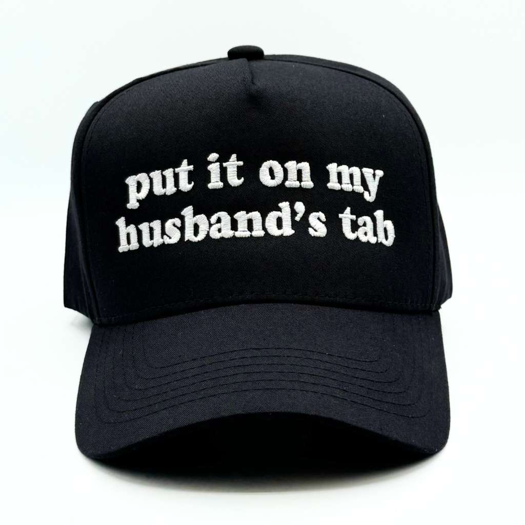 5 Panel black baseball hat embroidered with the phrase put it on my husband&