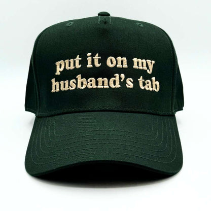 5 Panel Forest Green baseball hat embroidered with the phrase put it on my husband&