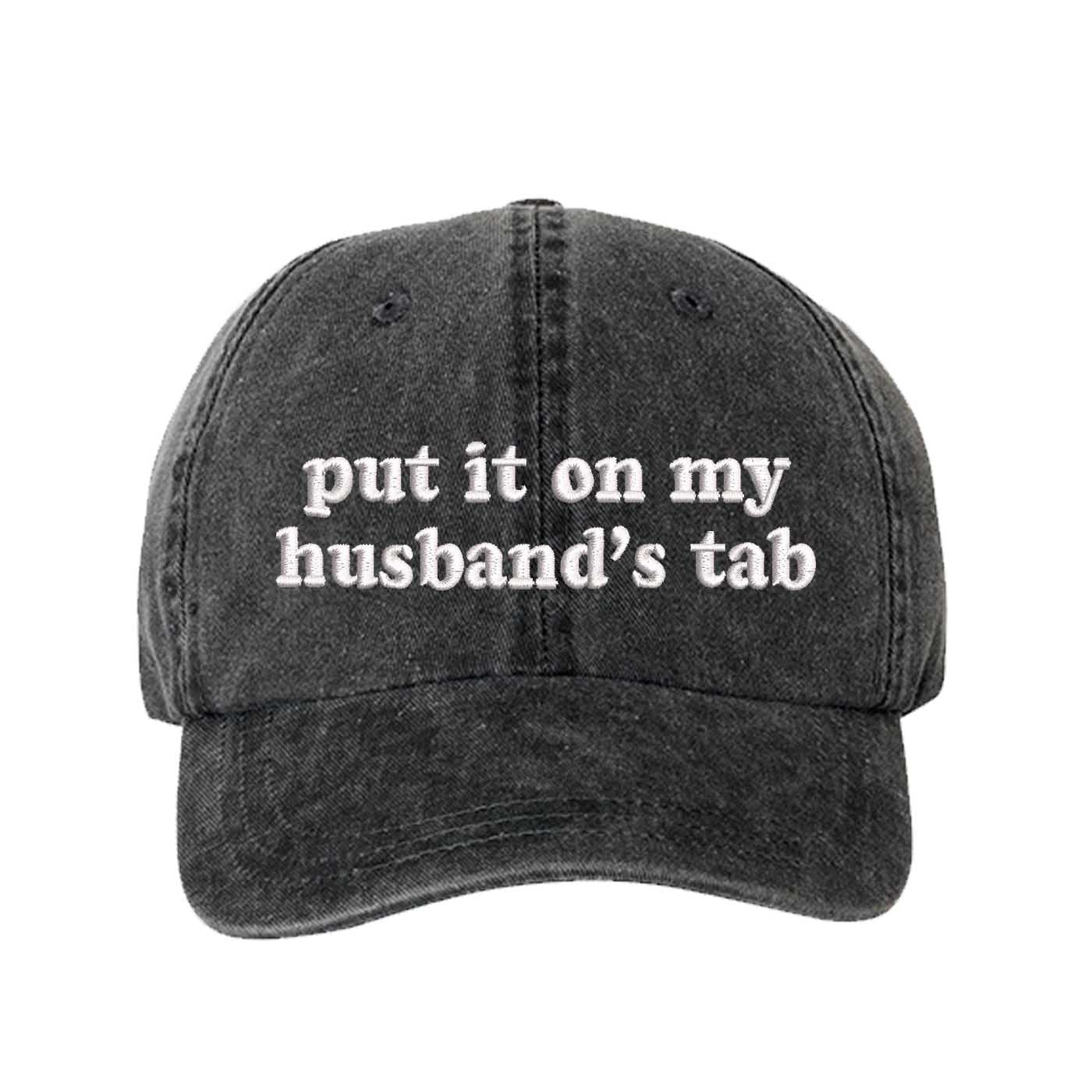 Black Put It On My Husband’s Tab washed cotton baseball hat with a soft finish and high-density white embroidery by DSY Lifestyle. - DSY Lifestyle