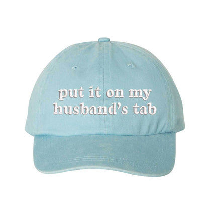 Light Blue Put It On My Husband’s Tab washed cotton baseball hat with a soft finish and high-density white embroidery by DSY Lifestyle. - DSY Lifestyle
