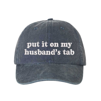 Navy Blue Put It On My Husband’s Tab washed cotton baseball hat with a soft finish and high-density white embroidery by DSY Lifestyle. - DSY Lifestyle