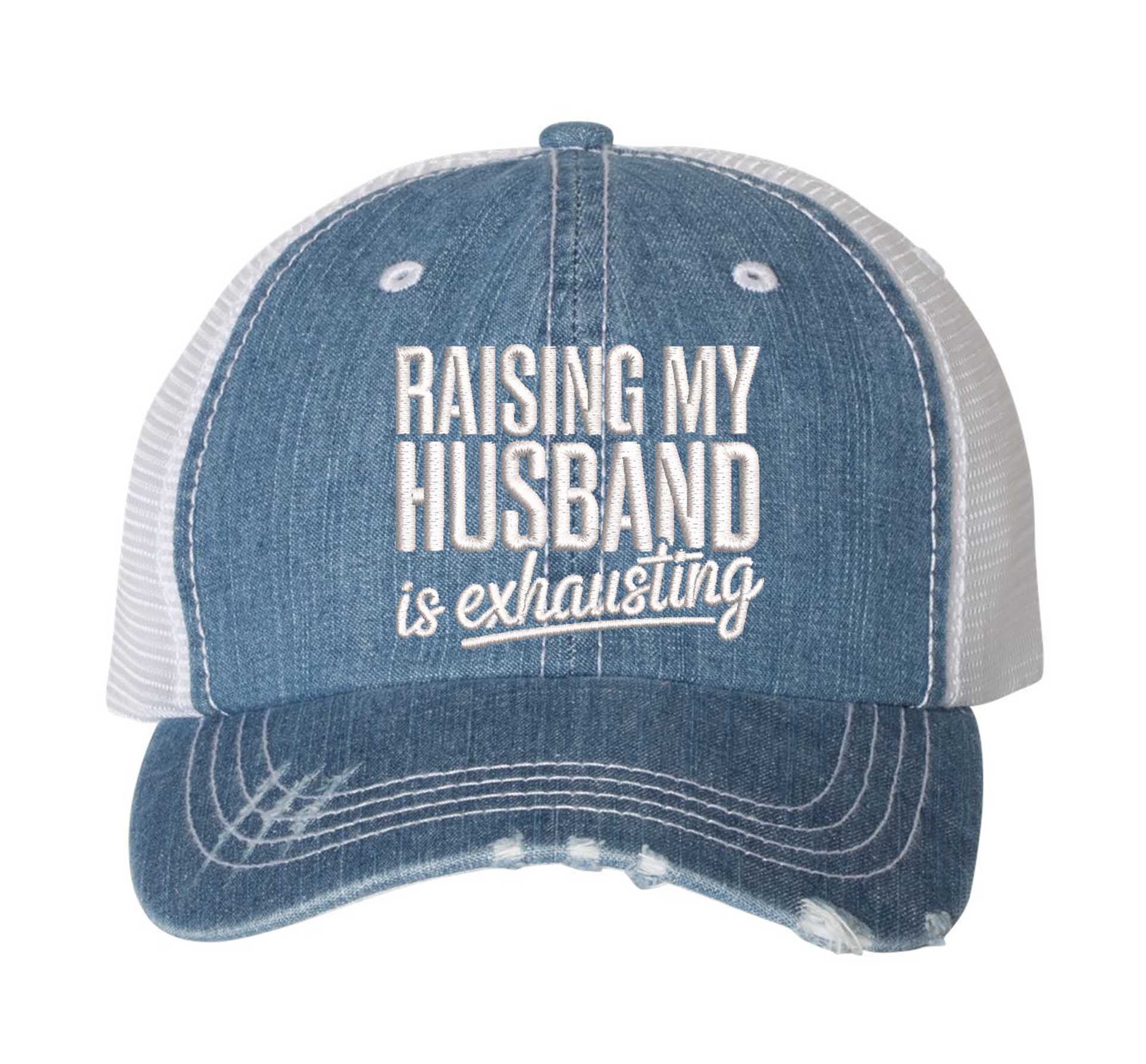 Light Denim DSY Lifestyle distressed trucker hat featuring the phrase Raising My Husband Is Exhausting in bold, professional embroidery. - DSY Lifestyle