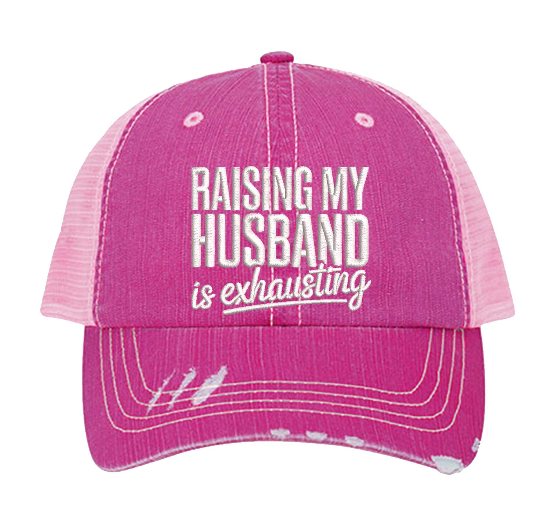 Pink DSY Lifestyle distressed trucker hat featuring the phrase Raising My Husband Is Exhausting in bold, professional embroidery. - DSY Lifestyle