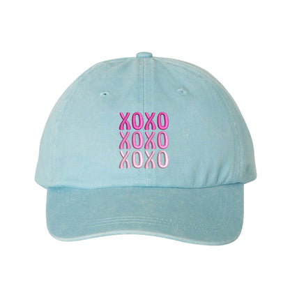 Sky Blue XOXO Washed Baseball Hat featuring white "XOXO" embroidery on a vintage-washed charcoal dad cap by DSY Lifestyle.
