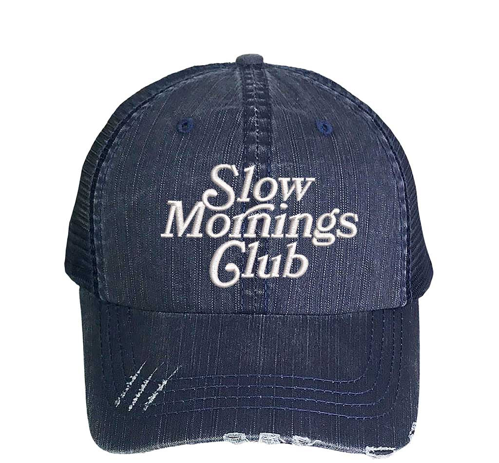 Navy blue distressed trucker cap embroidered with Slow Mornings Club DSY Lifestyle