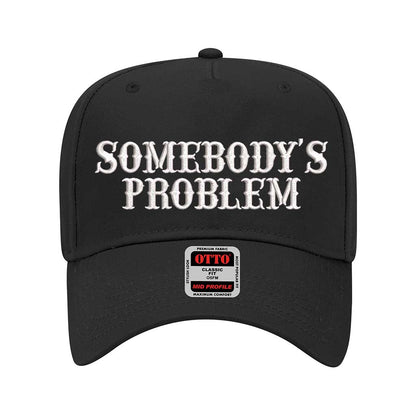 Solid Black 5 panel Somebody’s Problem embroidered dad hat with white front panel, beige brim, bold black text, and adjustable strap. – DSY Lifestyle.