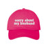 Hot Pink Sorry About My Husband Embroidered Baseball Hat in classic cotton dad cap style with curved brim and hook and loop closure. DSY Lifestyle.