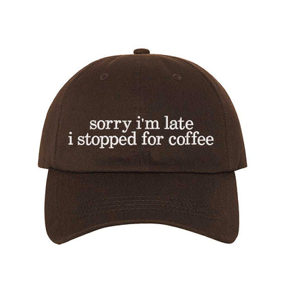 Brown DSY Lifestyle cotton baseball hat featuring the phrase Sorry I&