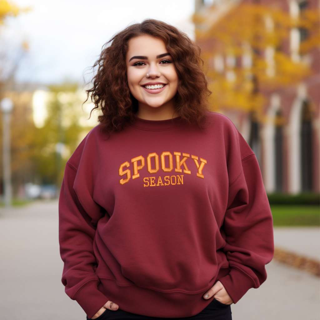 Burgundy Sweatshirt embroidered with spooky season in orange thread - DSY Lifestyle