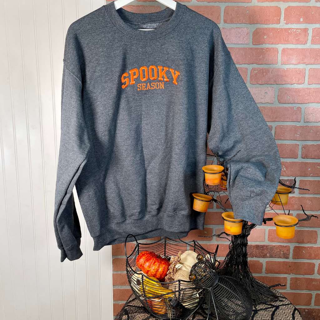 Dark heather gray Sweatshirt embroidered with spooky season in orange thread - DSY Lifestyle