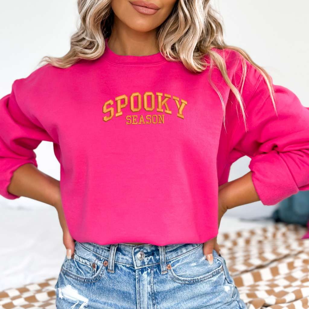 Hot Pink Sweatshirt embroidered with spooky season in orange thread - DSY Lifestyle