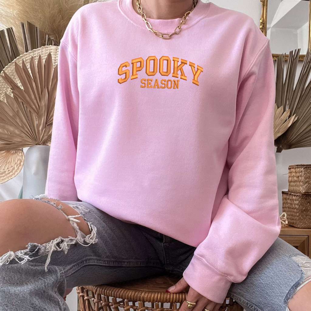 Light Pink Sweatshirt embroidered with spooky season in orange thread - DSY Lifestyle