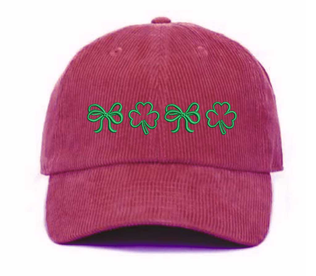 Burgundy soft corduroy baseball hat with embroidered bow and clover doodles, combining cozy texture with playful design for a stylish, everyday look - DSY Lifestyle