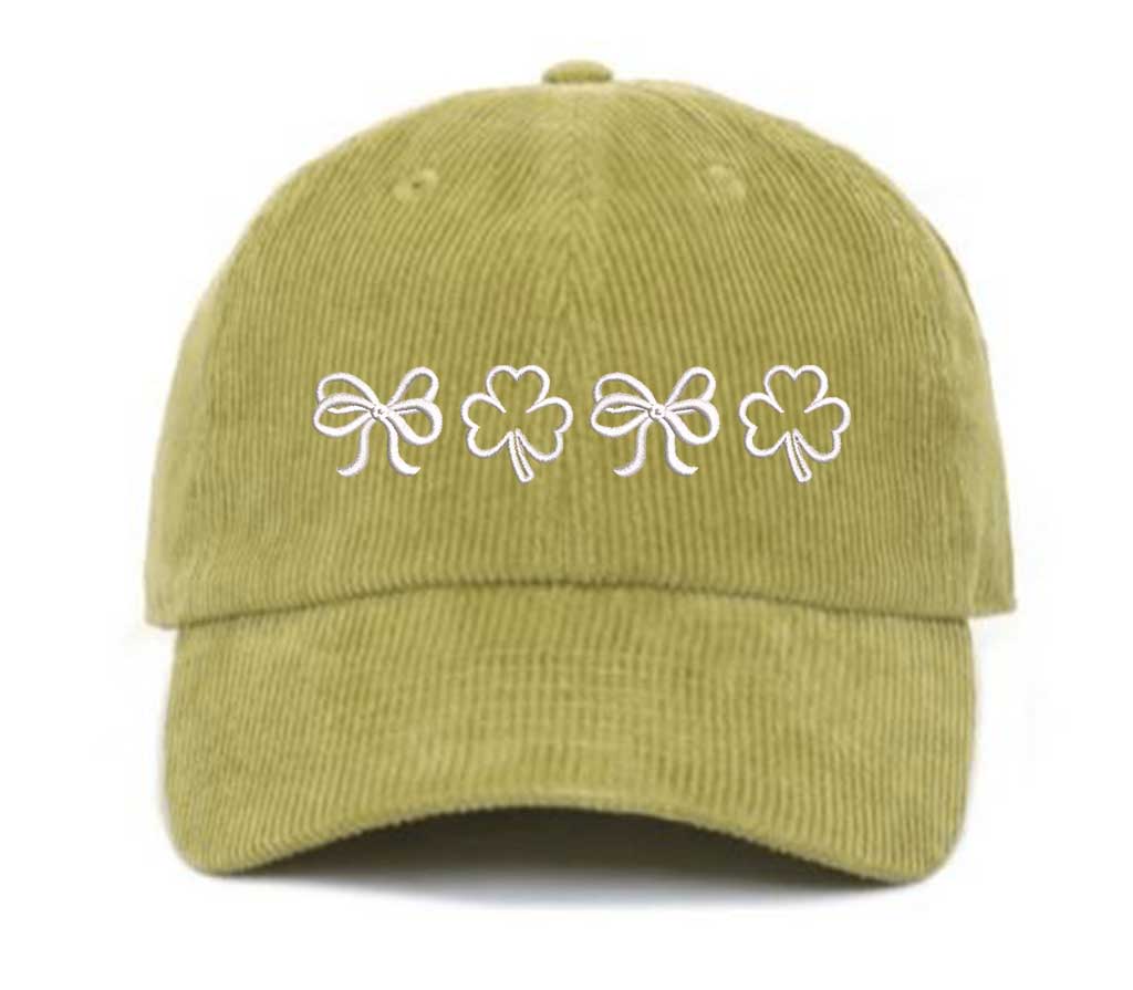 Wasabi Green soft corduroy baseball hat with embroidered bow and clover doodles, combining cozy texture with playful design for a stylish, everyday look - DSY Lifestyle