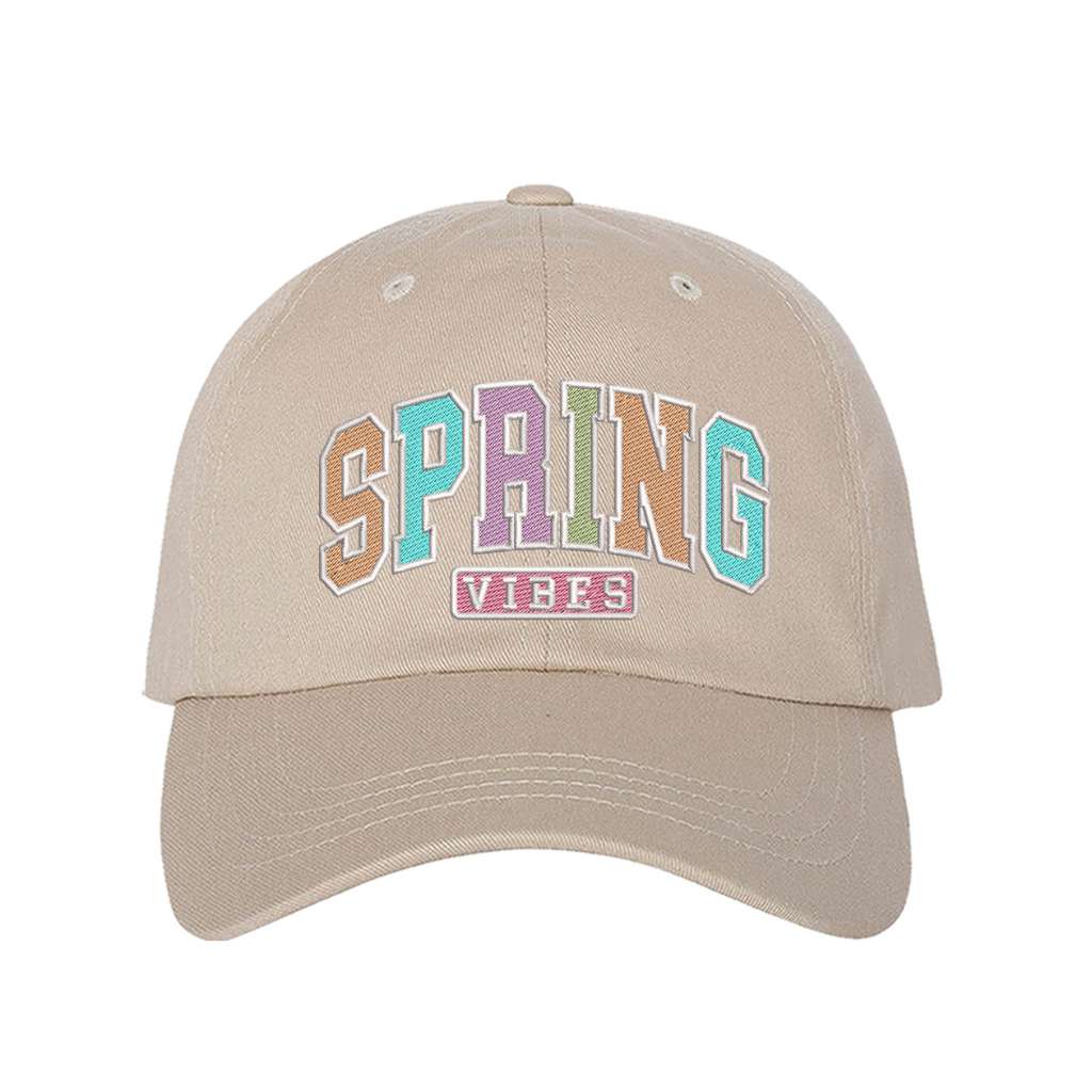 Stone baseball hat embroidered with the phrase spring vibes on it- DSY Lifestyle