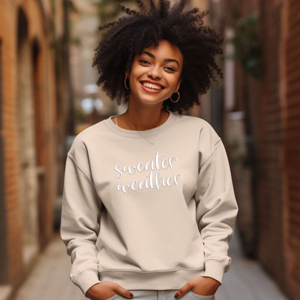 Female wearing a Sand Sweatshirt with sweater weather embroidered in the front - DSY Lifestyle