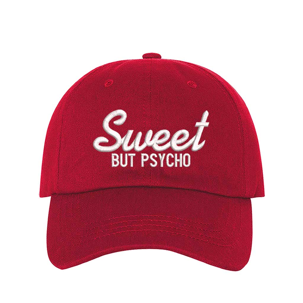 Red Close-up of a DSY Lifestyle baseball hat with "Sweet But Psycho" embroidered in a clean, modern font; a funny statement gift for her.