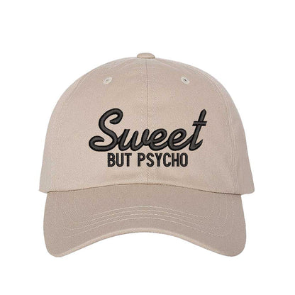 Stone Close-up of a DSY Lifestyle baseball hat with "Sweet But Psycho" embroidered in a clean, modern font; a funny statement gift for her.