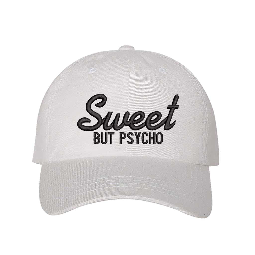 White Close-up of a DSY Lifestyle baseball hat with "Sweet But Psycho" embroidered in a clean, modern font; a funny statement gift for her.