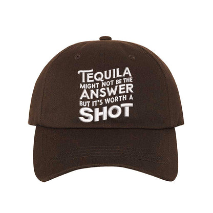 Brown Cotton baseball hat with “Tequila Might Not Be The Answer But It’s Worth A Shot” embroidered on the front, pre-curved brim, and adjustable strap. DSY Lifestyle.