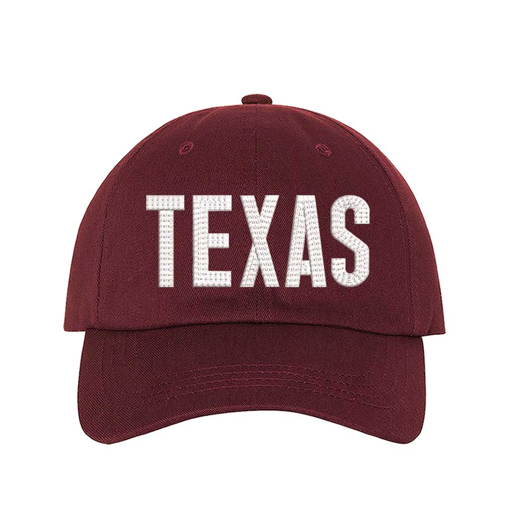 Burgundy Texas chainstitched embroidered baseball hat with Texas map design. A statement baseball hat for women who love Texas pride, street style, and effortless outfits. - DSY Lifestyle