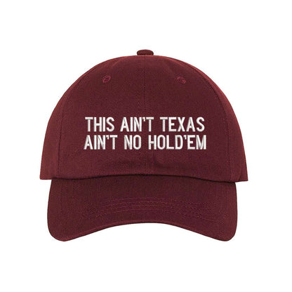 Burgundy baseball hat that has the phrase this ain&