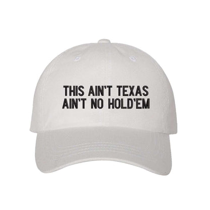 White baseball hat that has the phrase this ain&
