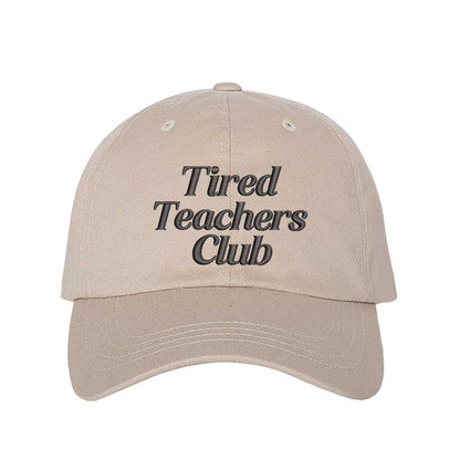 Stone DSY Lifestyle cotton baseball hat featuring the phrase Tired Teacher Club in bold, detailed professional embroidery. - DSY Lifestyle