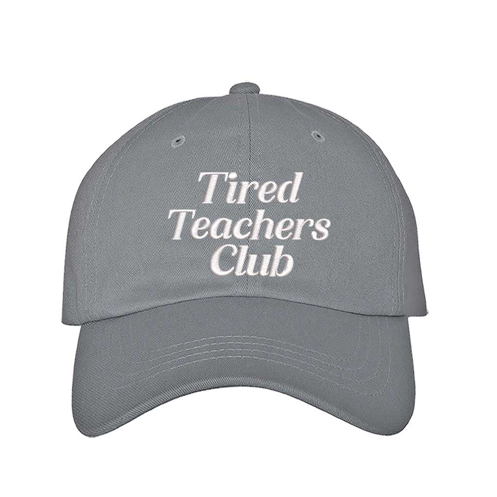 Gray DSY Lifestyle cotton baseball hat featuring the phrase Tired Teacher Club in bold, detailed professional embroidery. - DSY Lifestyle