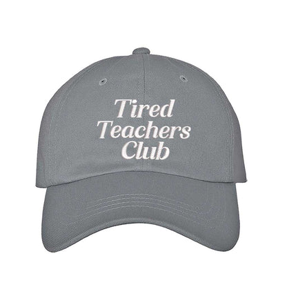 Gray DSY Lifestyle cotton baseball hat featuring the phrase Tired Teacher Club in bold, detailed professional embroidery. - DSY Lifestyle