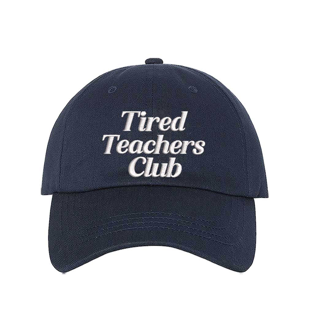 Navy Blue DSY Lifestyle cotton baseball hat featuring the phrase Tired Teacher Club in bold, detailed professional embroidery. - DSY Lifestyle