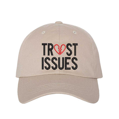 Stone Trust Issues Baseball Hat featuring "Trust Issues" embroidered in a bold font on a classic dad cap; a funny and relatable statement accessory from DSY Lifestyle.