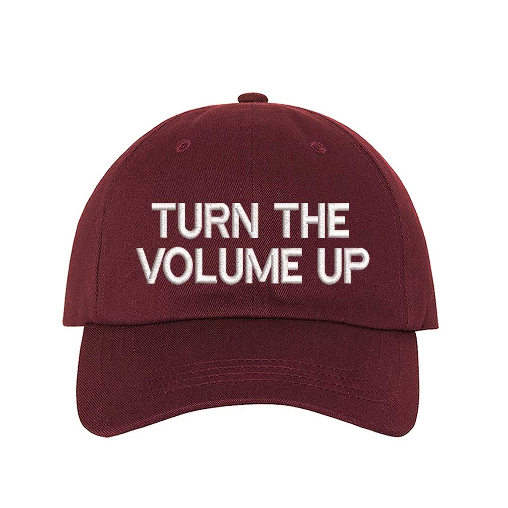 Burgundy Turn Up The Volume Embroidered Baseball Hat featuring classic design, music-inspired embroidery, and adjustable hook and loop closure – DSY Lifestyle